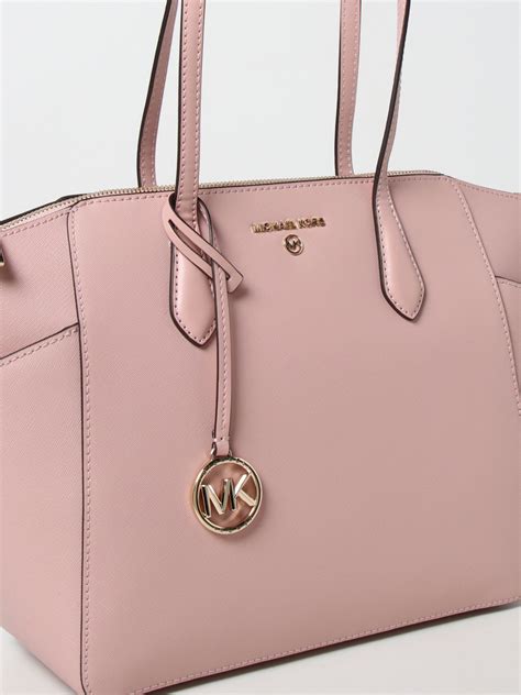 michael kors pink suitcase|Michael Kors pink shoulder bag.